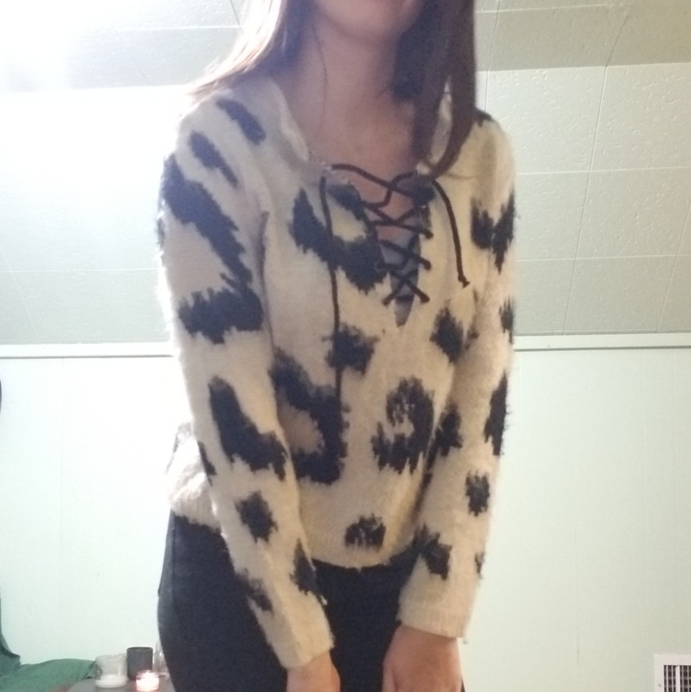 Woven heart lace up fuzzy sweater